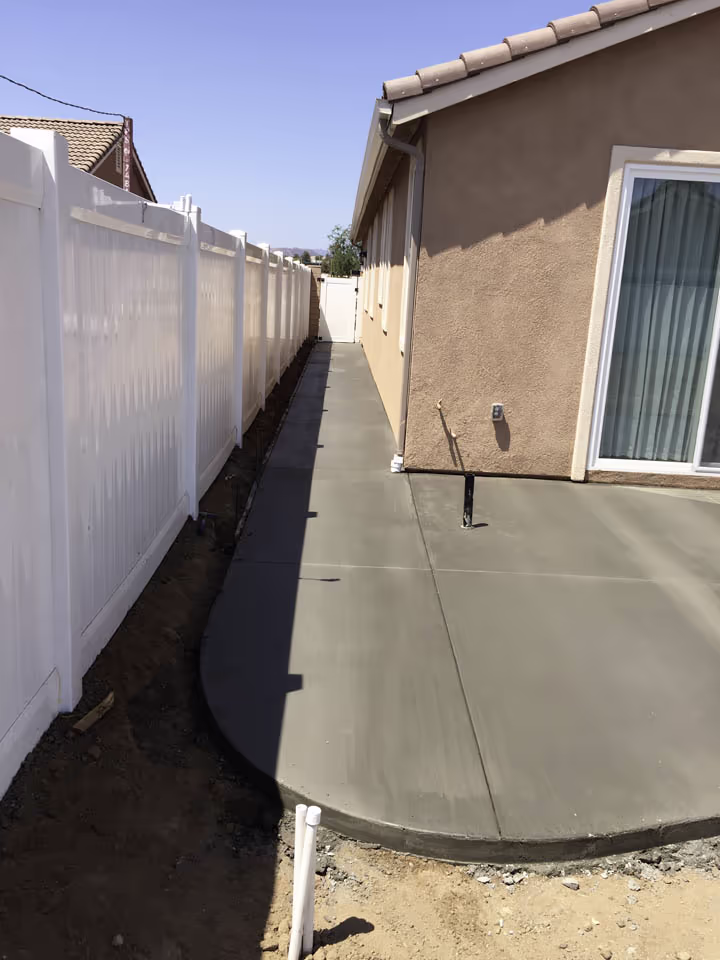 Residential Concrete Flatwork Back Patio Expansion — photo 1